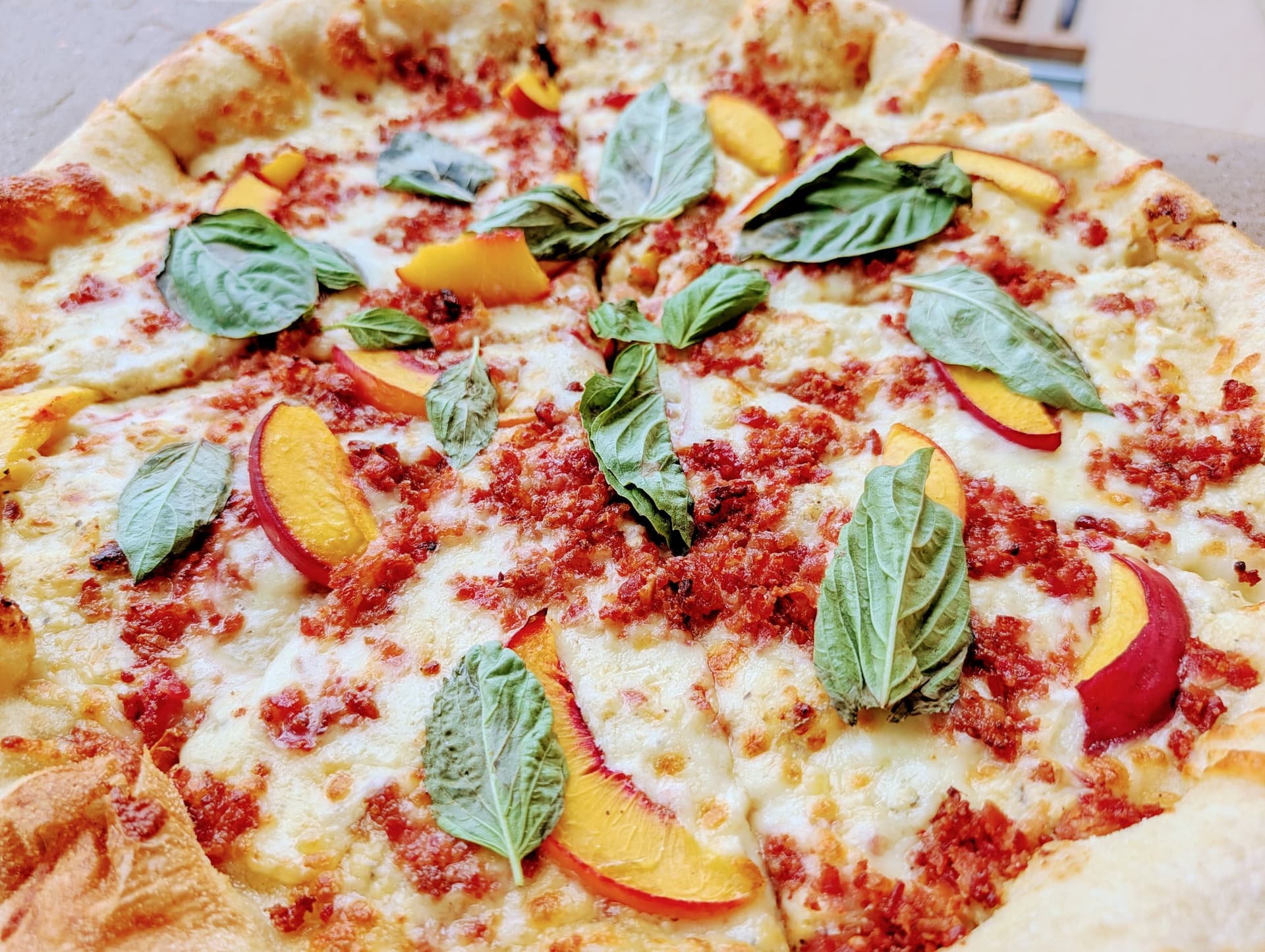 Peaches & Cream — brick-oven artisan pizza at Snowpack Pizzeria, Conifer Colorado